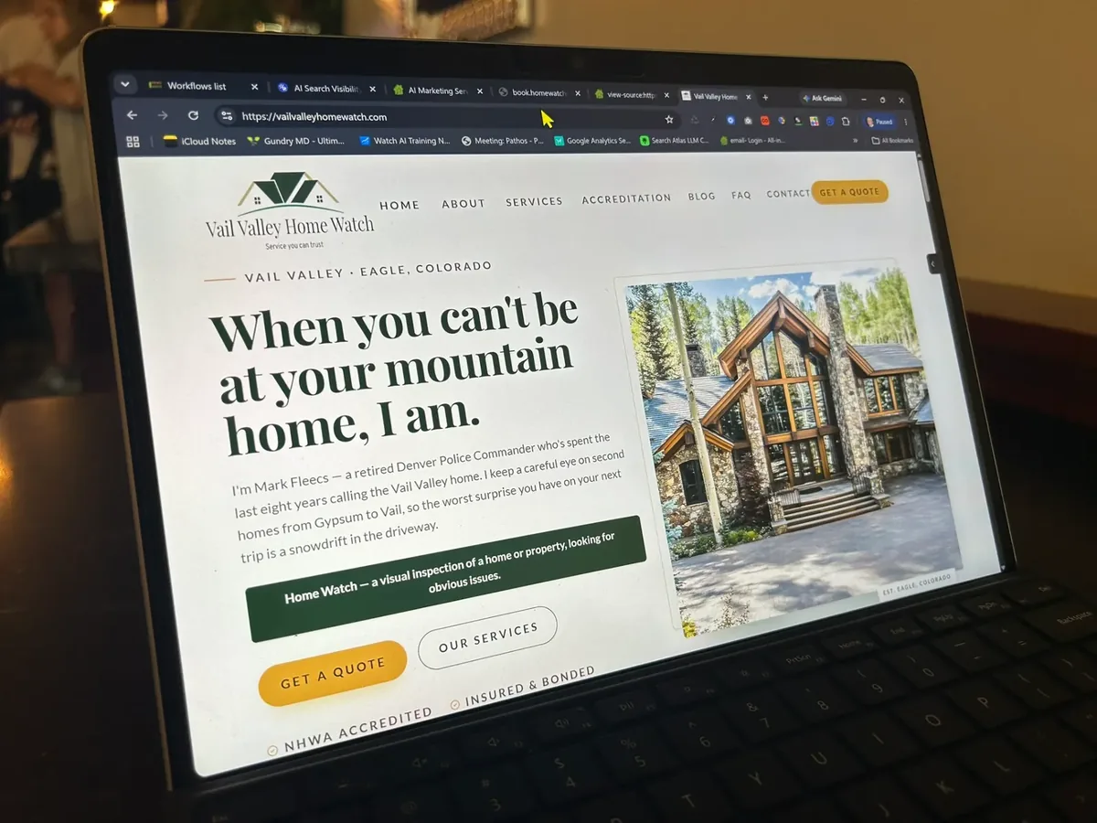 Laptop showing a Home Watch business website built by Home Watch Marketing